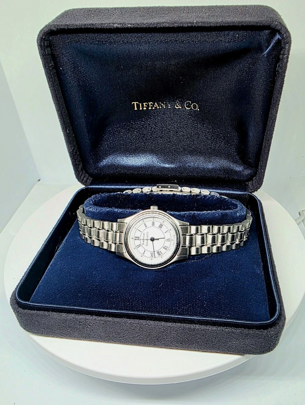 Tiffany & Co. Portfolio Stainless Steel Quartz Watch (Pre-loved) with its origin